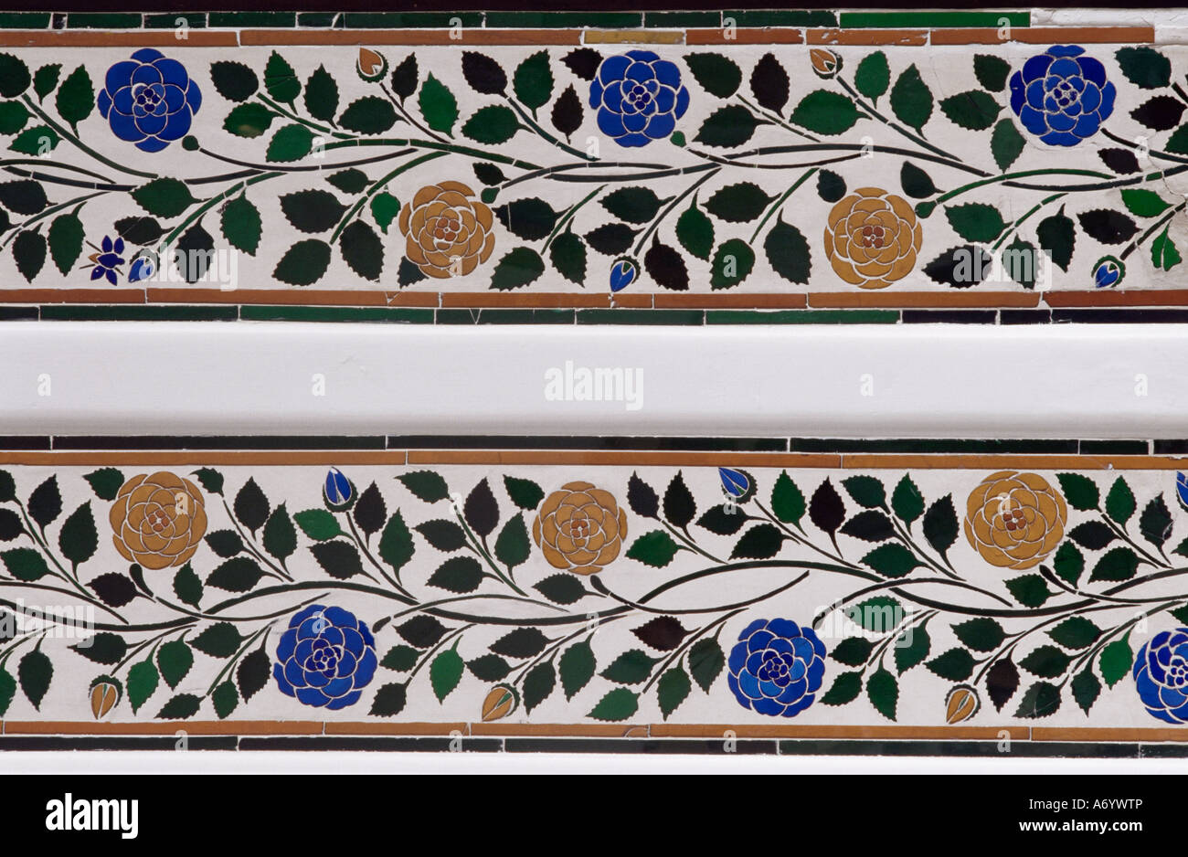 detail of the coloured glass and mirror inlay work found in the detail of the coloured glass and mirror inlay work found in the