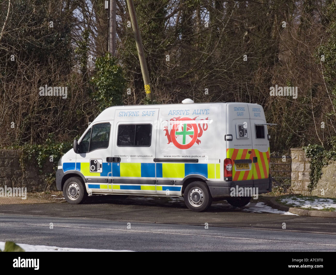 http://c8.alamy.com/comp/A7C0T0/police-mobile-speed-camera-vehicle-parked-beside-road-in-30-mph-speed-A7C0T0.jpg