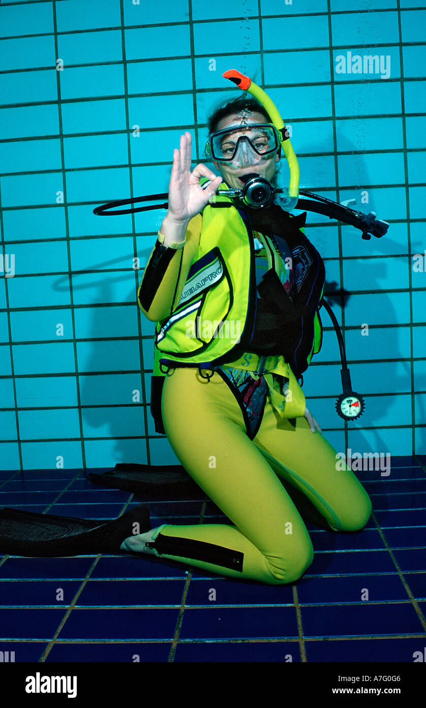 Scuba Diving Lessons In A Swimming Pool Giving Ok Signal Germany Stock