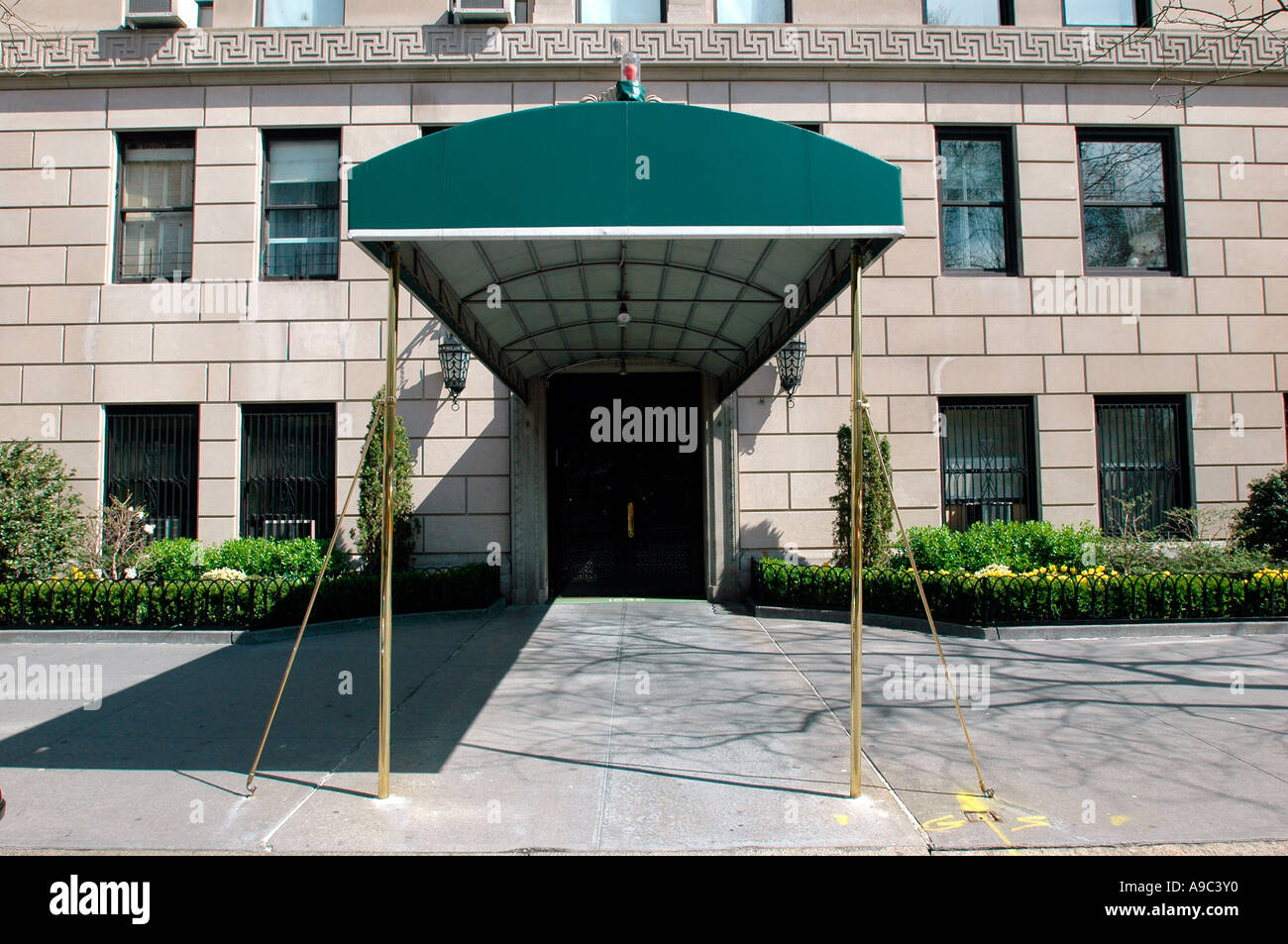 Apartment Building Entrance ritzy apartment building entrance in nyc stock photo, royalty free Apartment Building Entrance ritzy apartment building entrance in nyc stock photo, royalty free