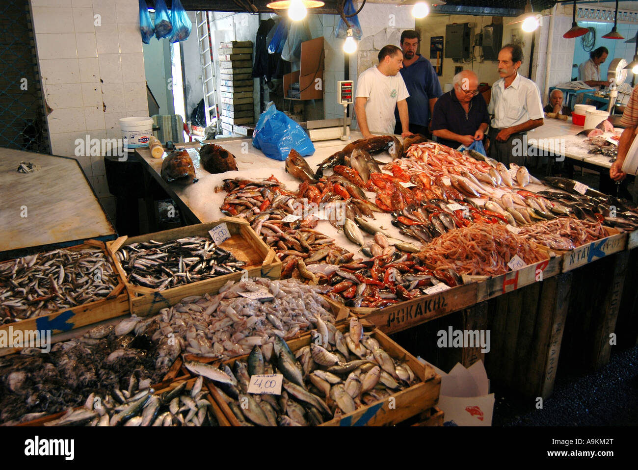 Fresh wet fish stall in a local street market Chania Crete Stock Photo