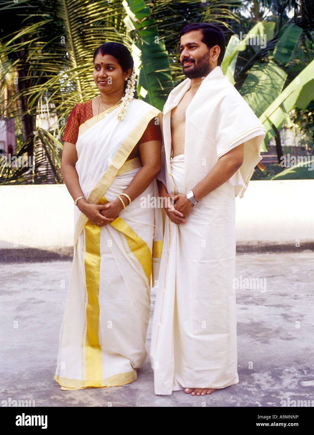 A COUPLE IN TRADITIONAL KERALA ATTIRE Stock Photo Royalty Free Image 