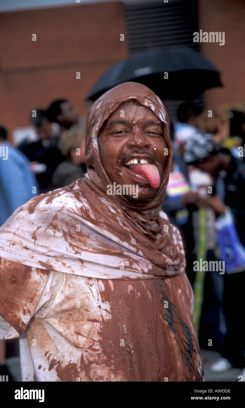 man-covered-in-chocolate-at-the-notting-hill-carnival-A9XDDE.jpg