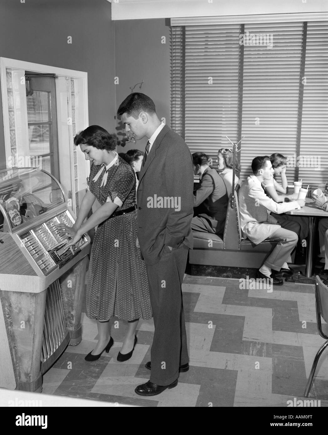 young couple playing in store