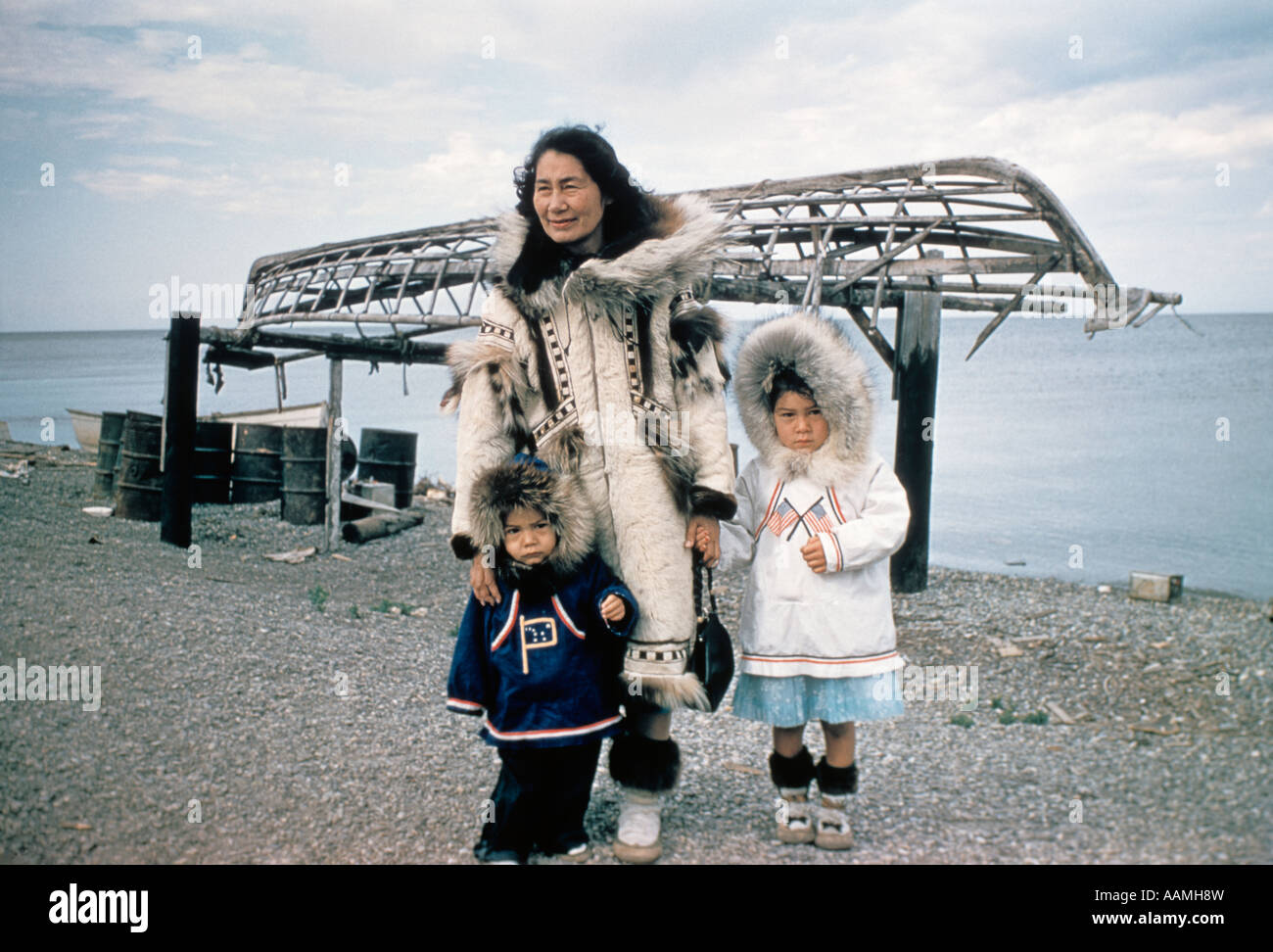 1960s Inuit Mother Child Eskimo Wearing Parka Anarak Wood Boat Stock 