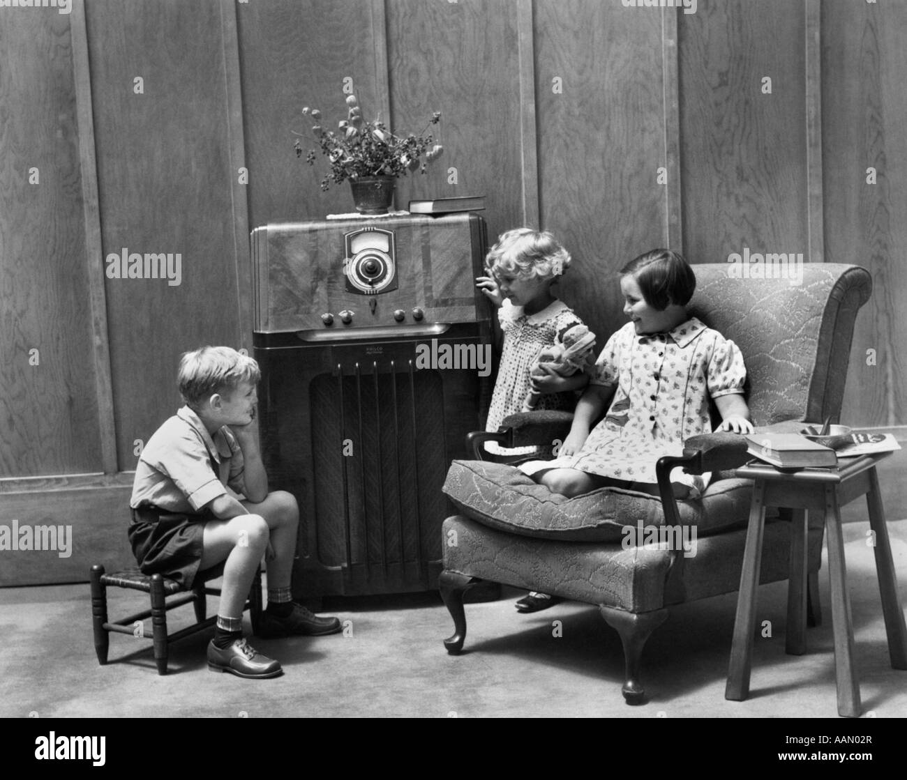 Living Room 1930s 1930s three children two boys one girl back view stepping into Living Room 1930s 1930s three children two boys one girl back view stepping into
