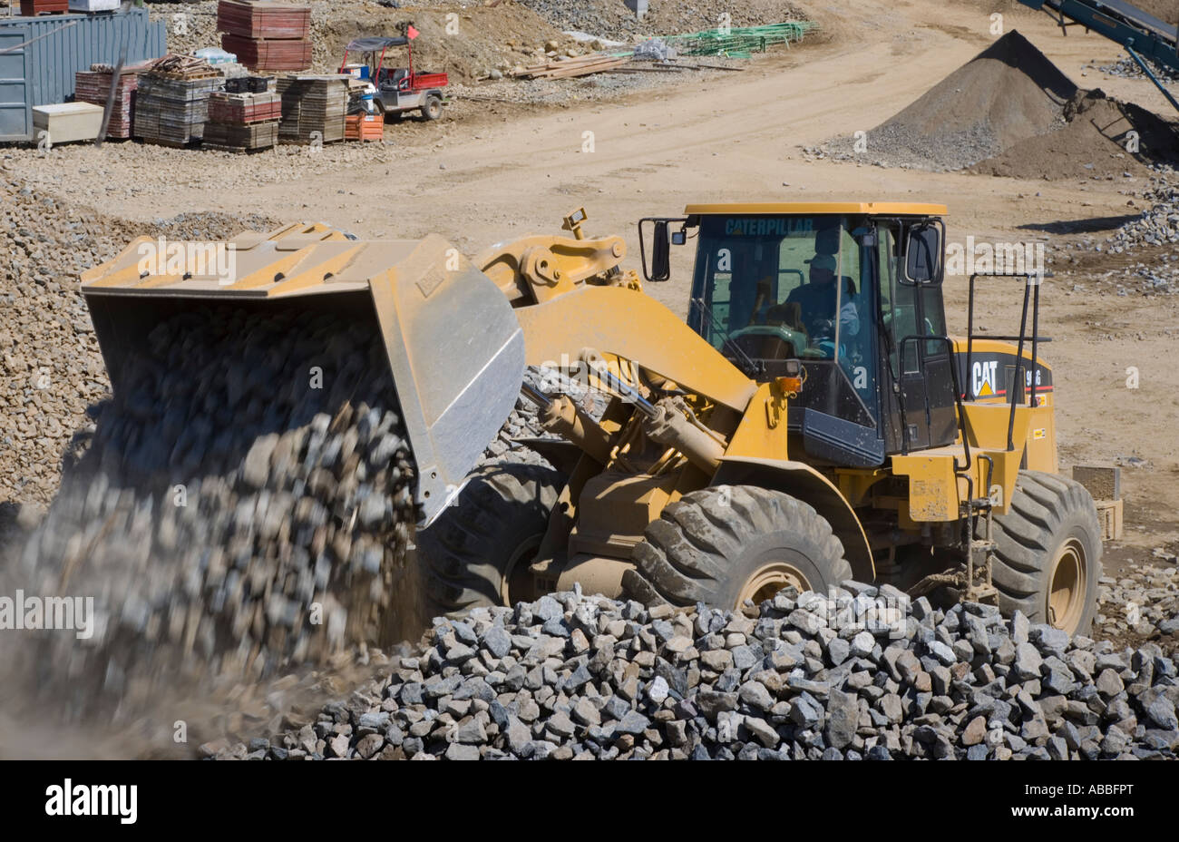 Truck moving rocks at a construction site Stock Photo, Royalty Free
