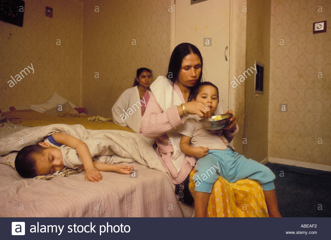 Bangladeshi family living in poor conditions East London UK Stock Photo, Royalty Free Image
