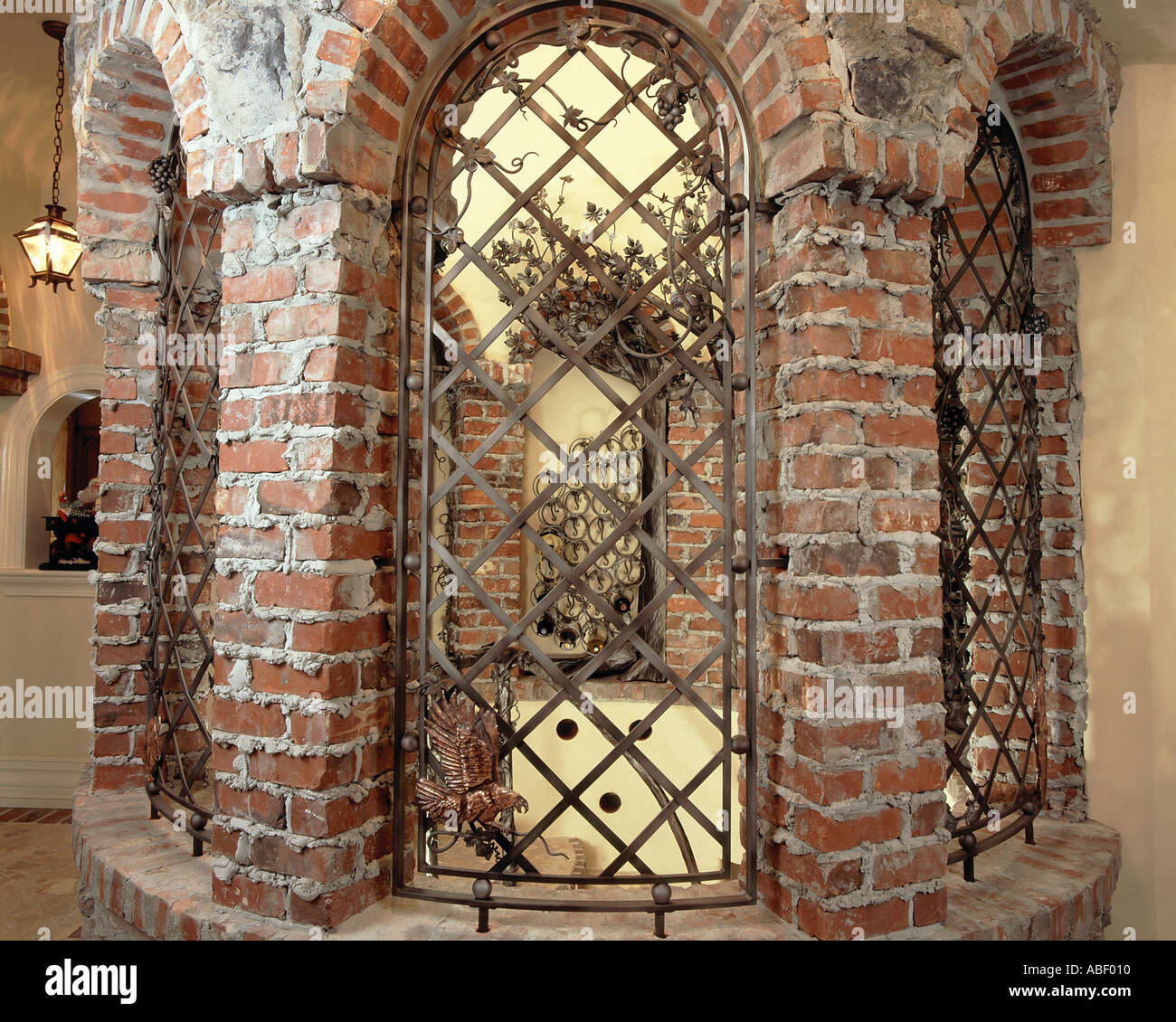 Custom wrought iron doors and stiarway to residential home wine Custom wrought iron doors and stiarway to residential home wine