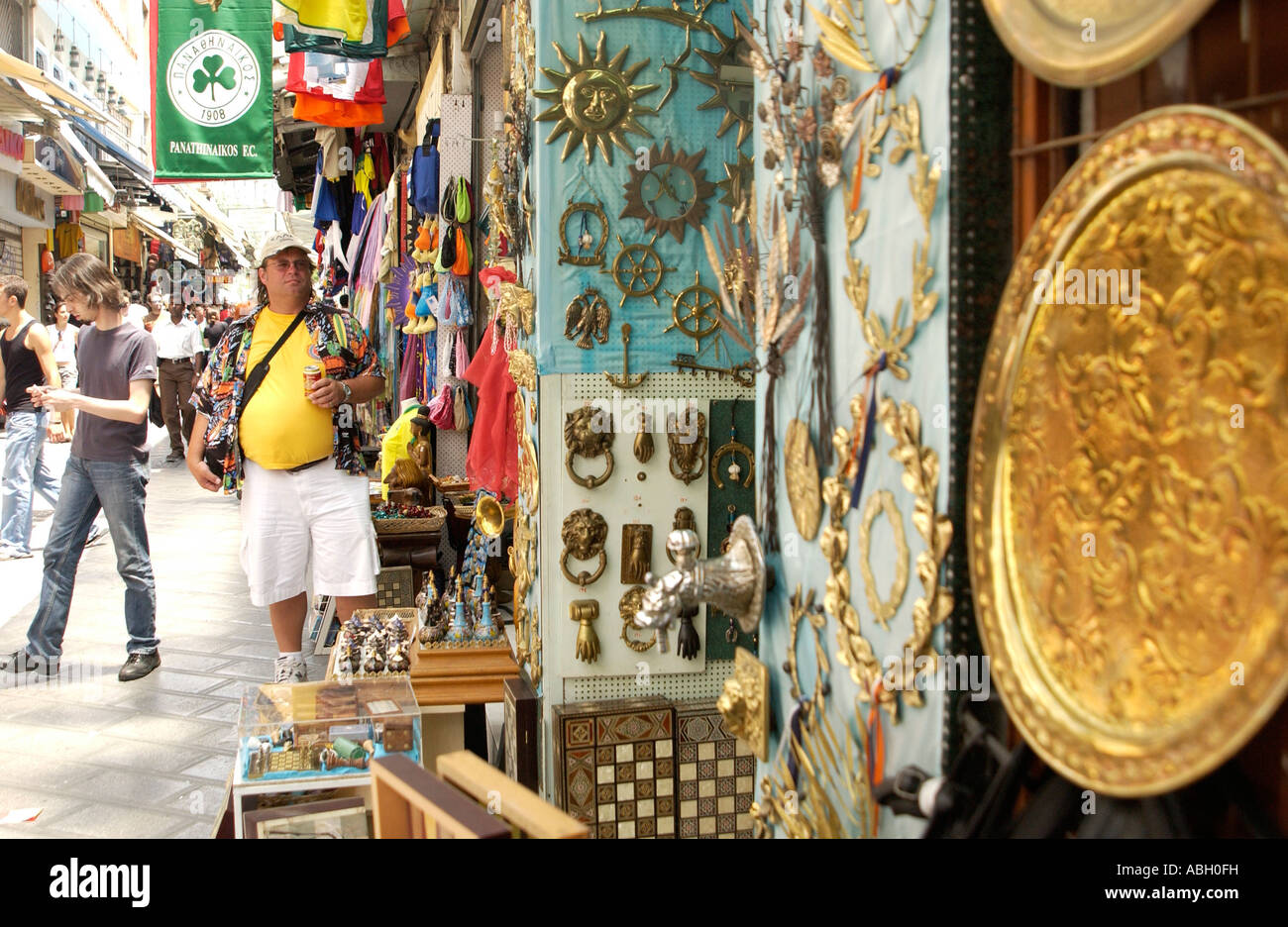 Tourists shop at the Monastiraki Flea market in the Plaka Athens Stock Photo, Royalty Free Image