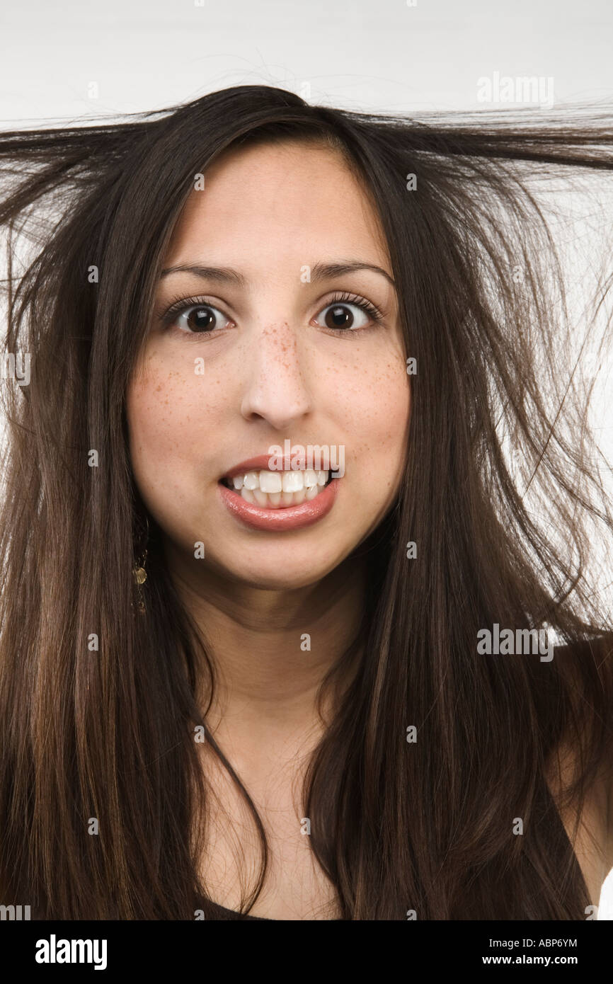 Woman Pulling At Her Hair Stock Photo Alamy