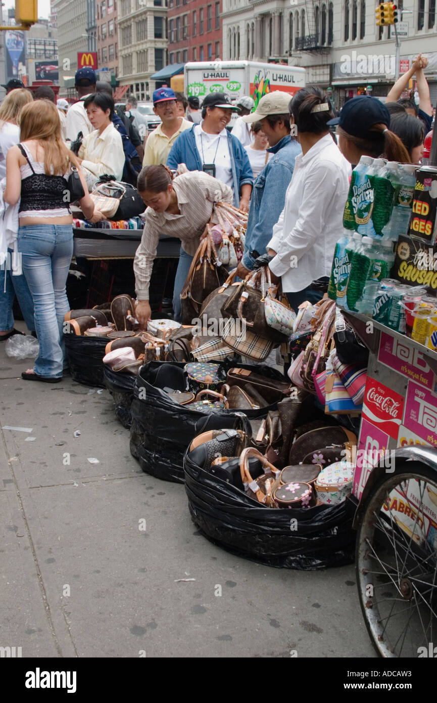 Handbag vendors selling knockoff handbags on Canal Street Lower Stock Photo, Royalty Free Image ...