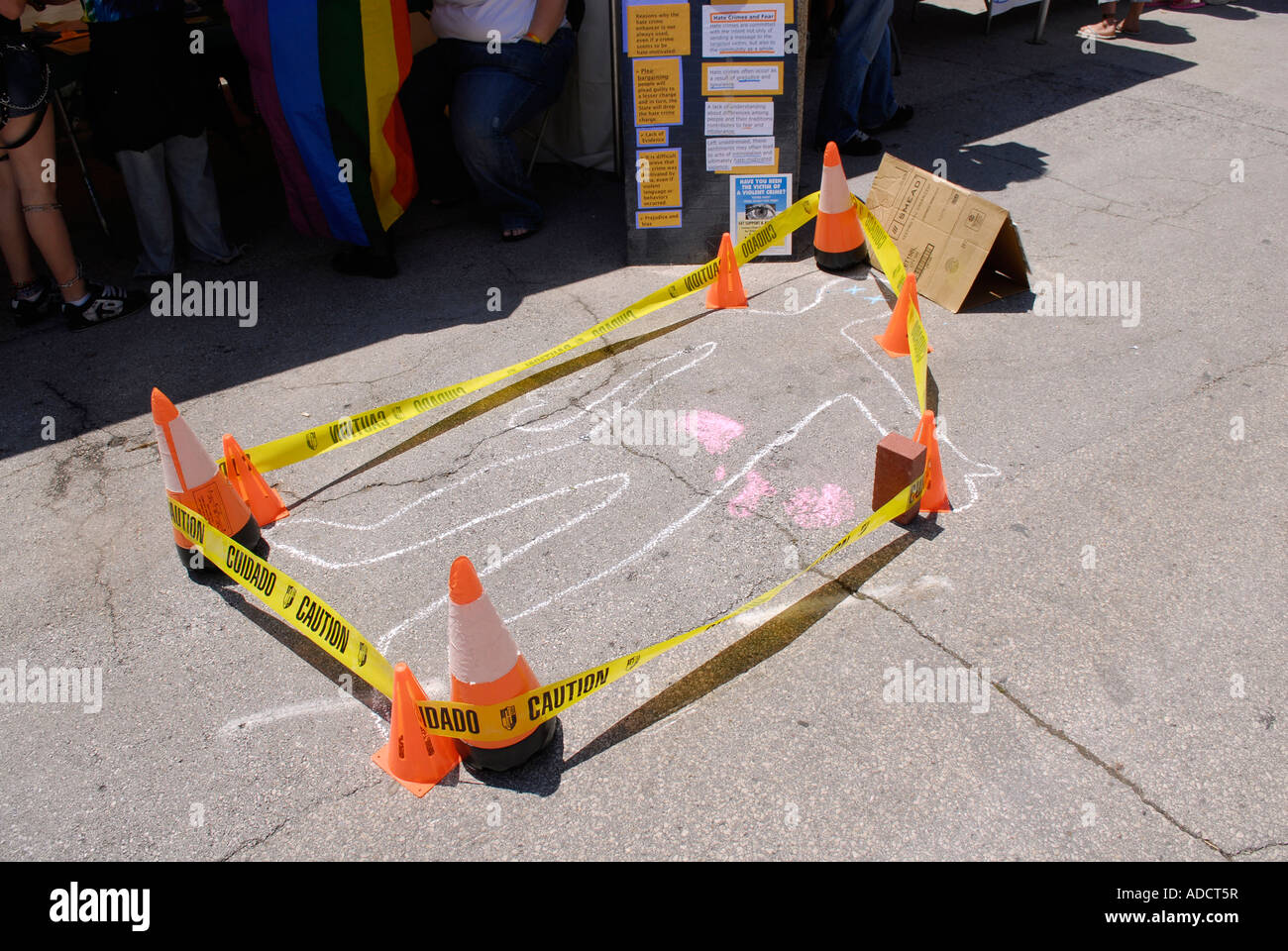 Chalk line on the cement street outlining a persons dead body Stock