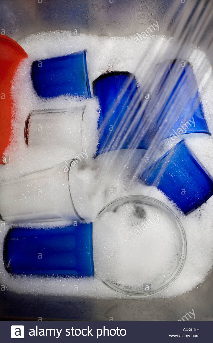 Kitchen Sink With Clean Dishes washing dirty dishes in the kitchen sink. water and dishwashing Kitchen Sink With Clean Dishes washing dirty dishes in the kitchen sink. water and dishwashing
