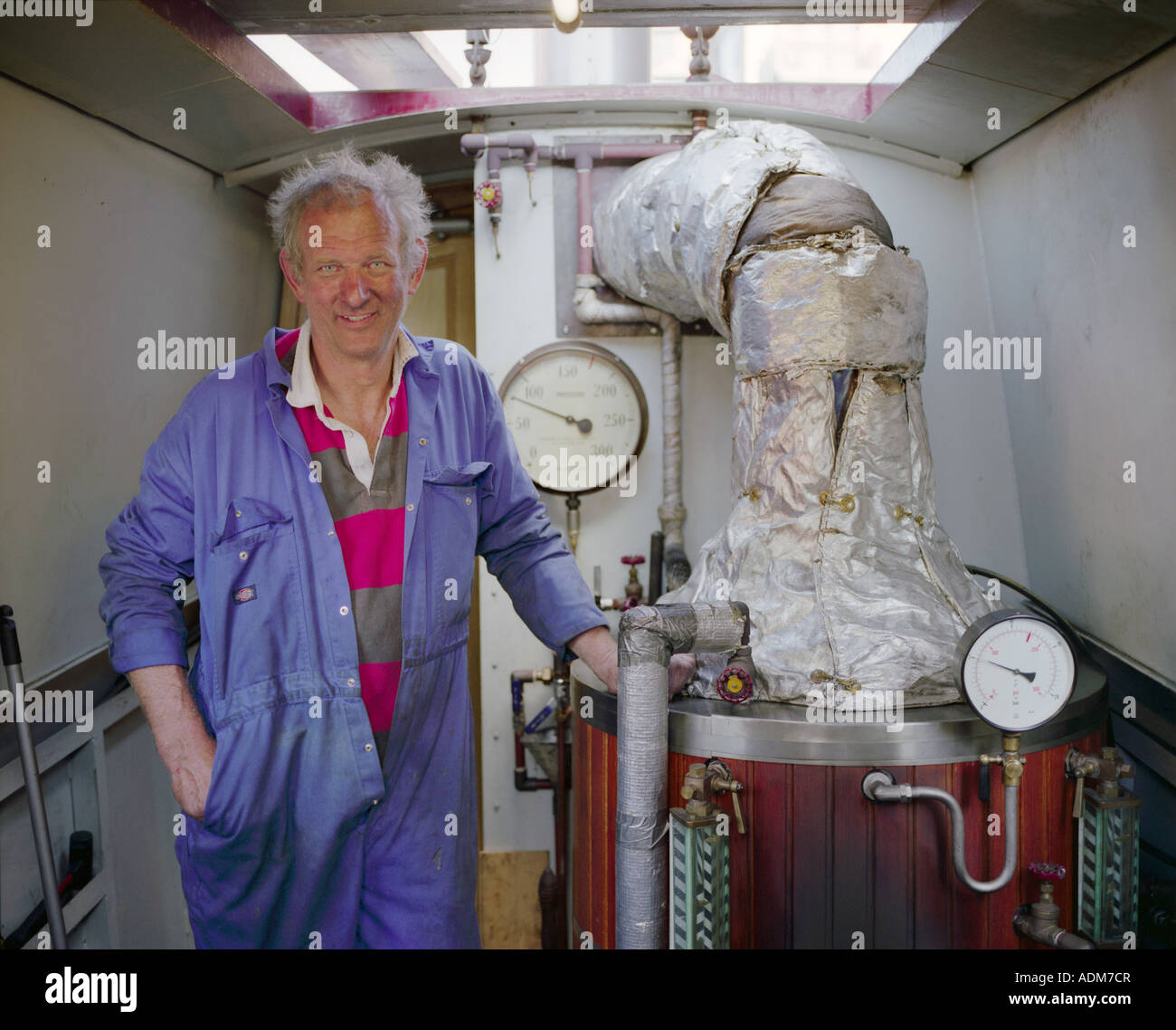 A Steam Engineer on Board the Steam Narrow Boat "Whistle Down the Stock