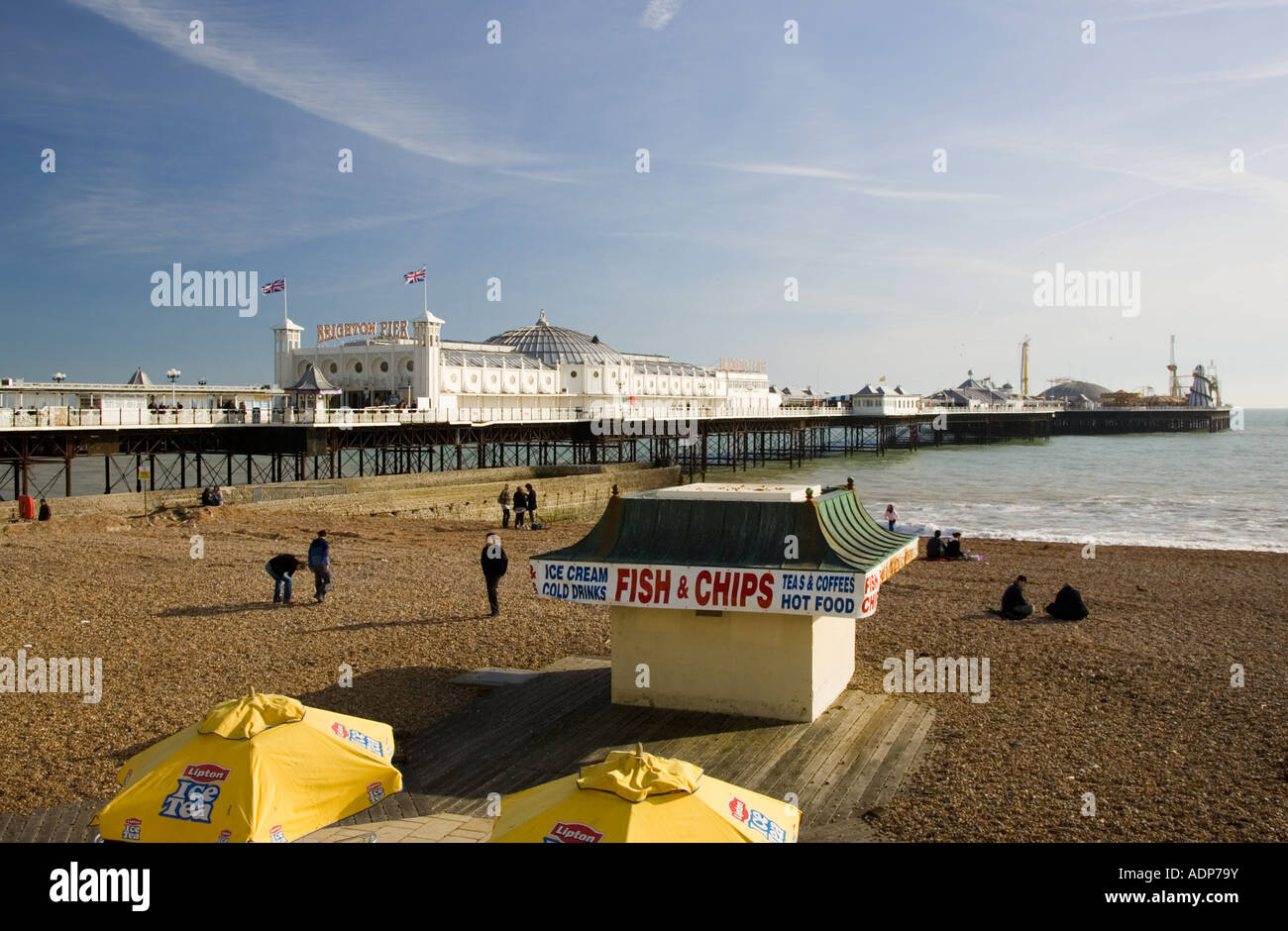 Fish and chip shop on beach by Brighton Pier England United Kingdom