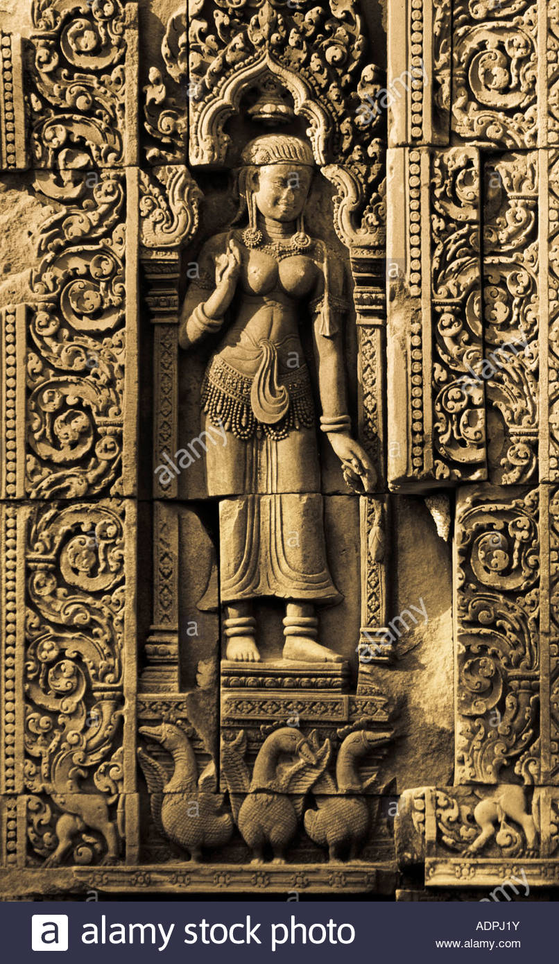 Apsara carved in stone wall. Angkor Wat, Cambodia Stock Photo, Royalty