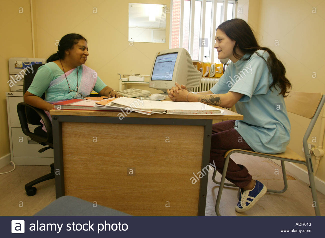 Detox Prison inmate talking to doctor on detox wing at holloway prison Detox Prison inmate talking to doctor on detox wing at holloway prison