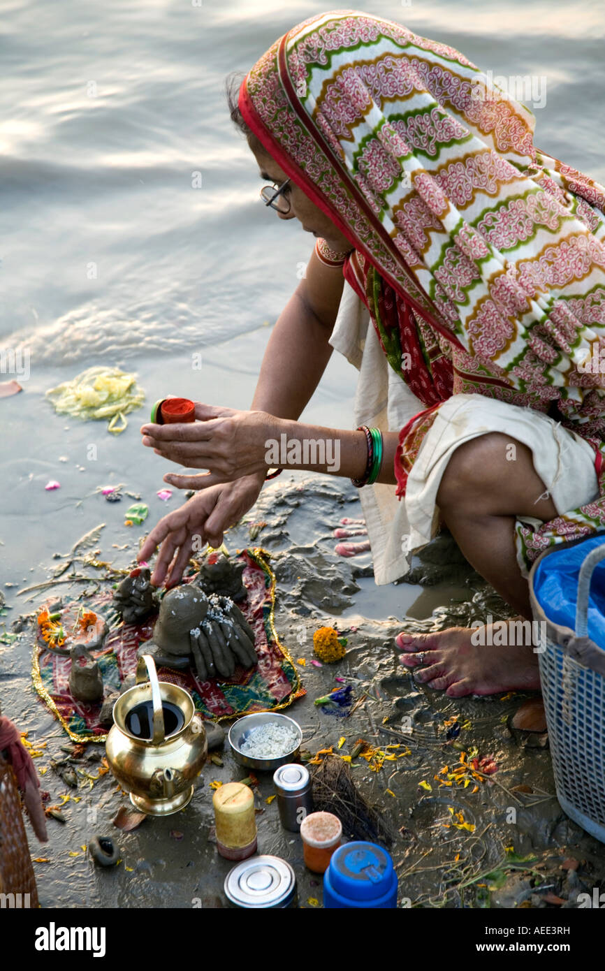 Woman Performing Ritual Puja Ceremony Shivala Ghat Ganges River Varanasi India Stock Photo