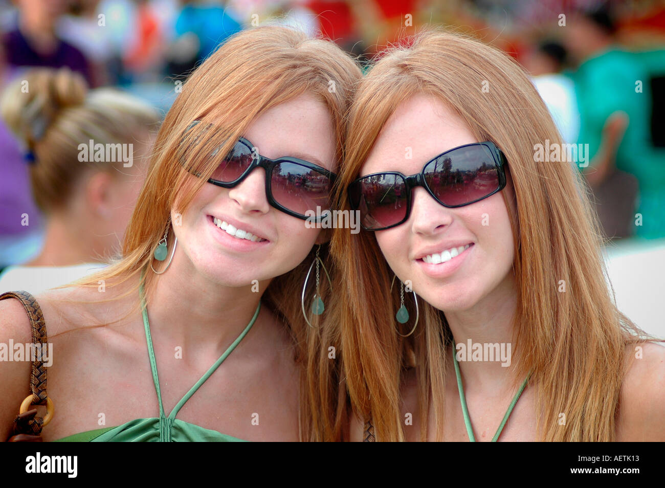Twin Sisters who look alike and act alike as twins at the Twins Stock Photo, Royalty Free Image