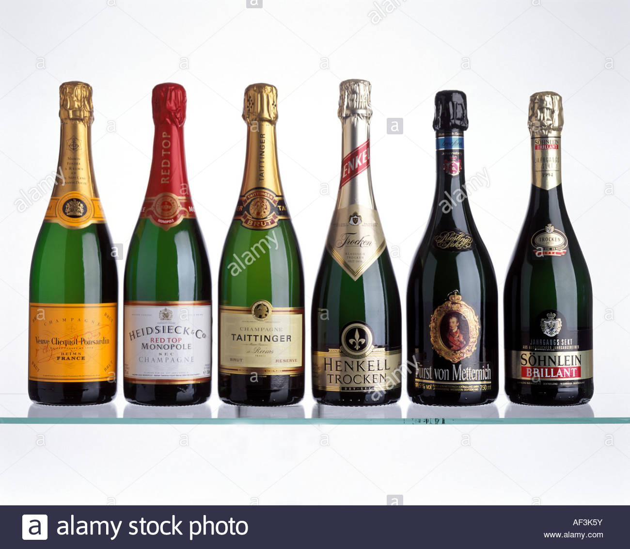 Six sparkling wine bottles with champagne and German Sekt Stock Photo
