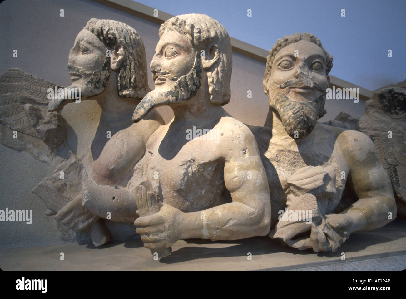 Greece Athens Acropolis Museum three male figures beards part of Stock