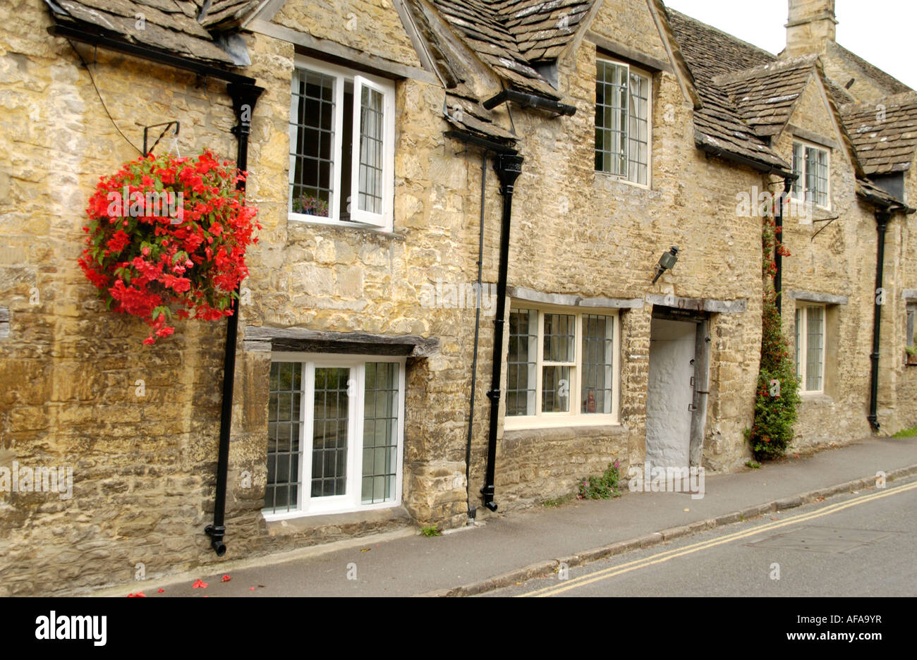 Traditional Cotswold terraced cottages in Castle Combe Wiltshire Stock Photo, Royalty Free Image