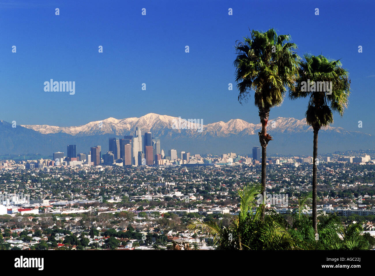 Snow covered San Gabriel Mountains behind downtown Los Angeles Stock