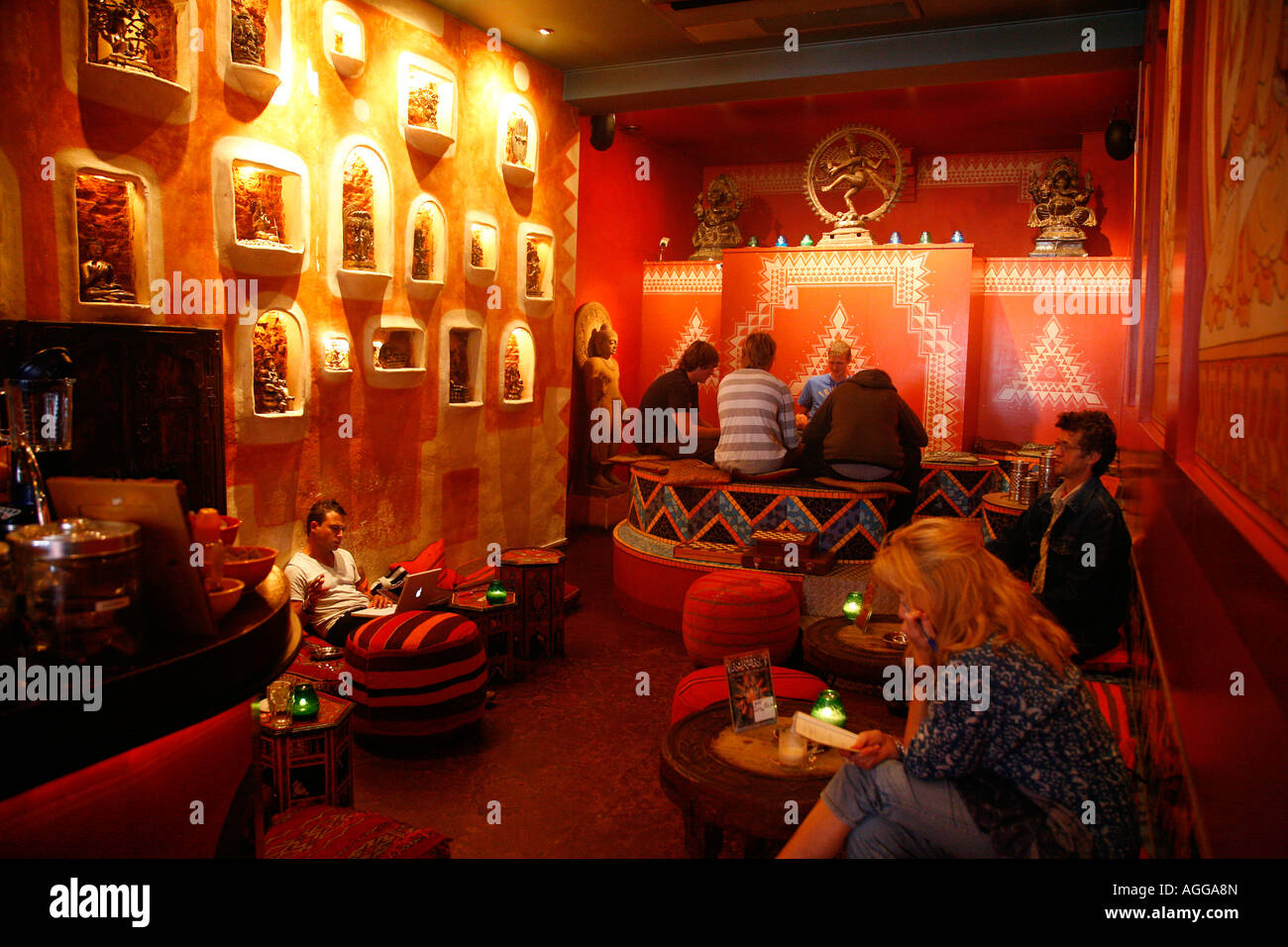 People sitting inside a Coffee shop called Rokery Amsterdam Holland