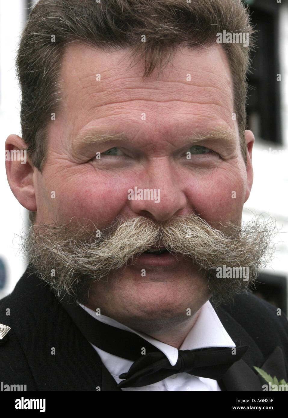 a-rugged-red-faced-man-with-a-magnificent-bristling-handlebar-moustache-AGHX5F.jpg