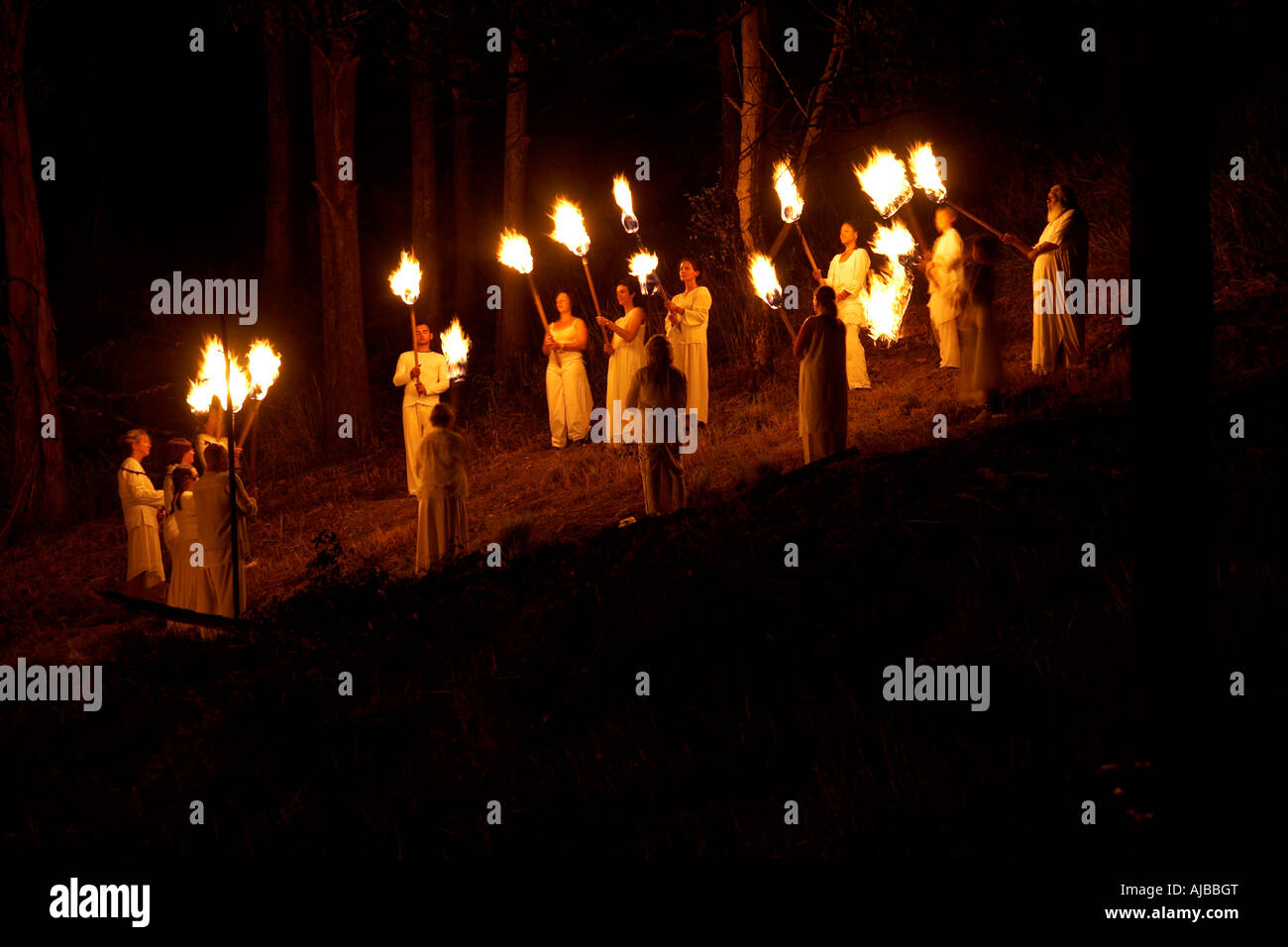people-standing-in-a-circle-in-woods-wit