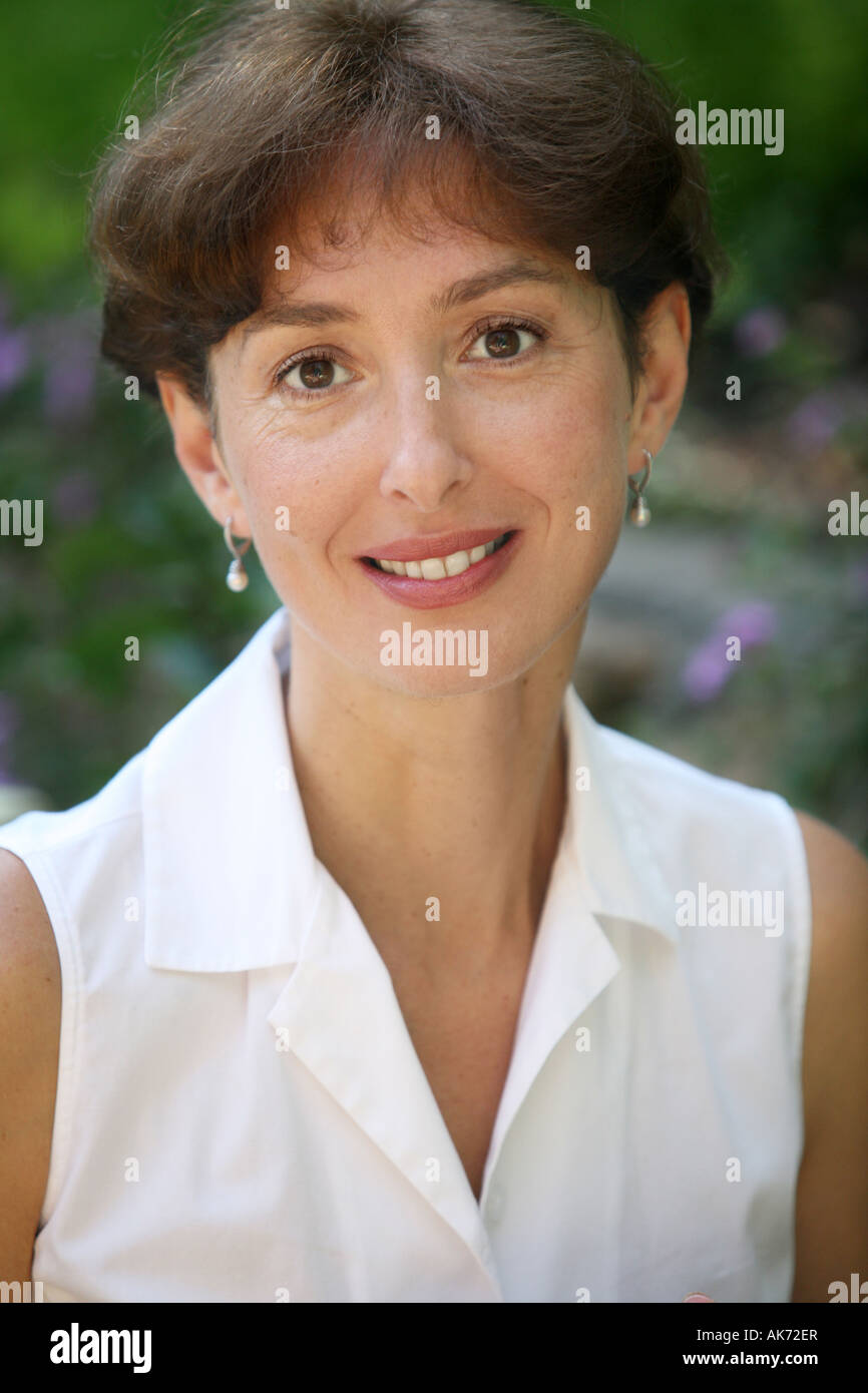 Beautiful Mature Woman In A White Blouse Stock Photo Alamy