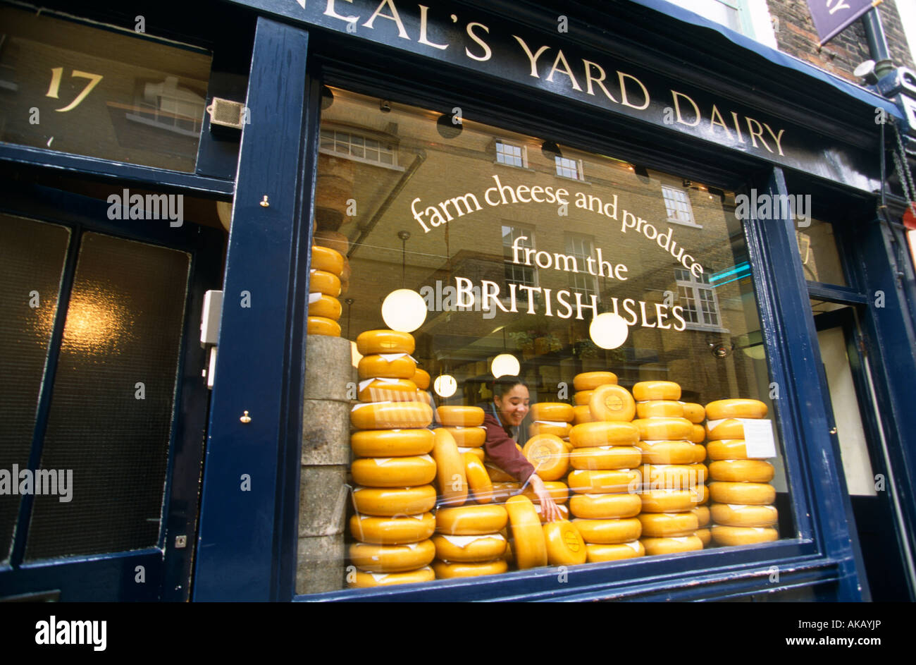 Neal's Yard Cheese Shop Covent Garden Girl Sells Cheeses Stock Photo, Royalty Free Image