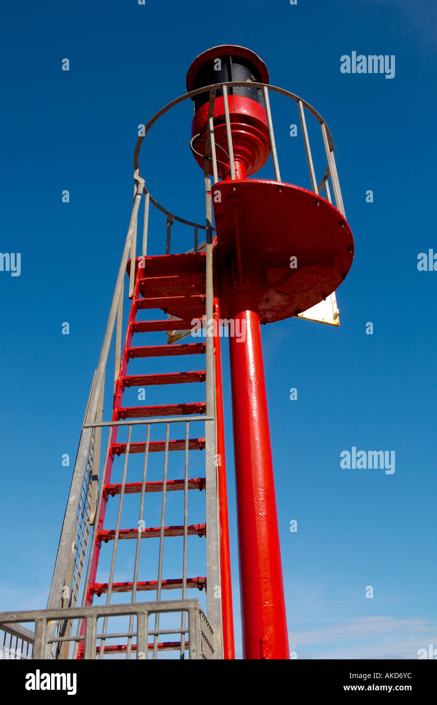 Red Navigation Light Situated On Banjo Pier In Looe Cornwall UK Stock