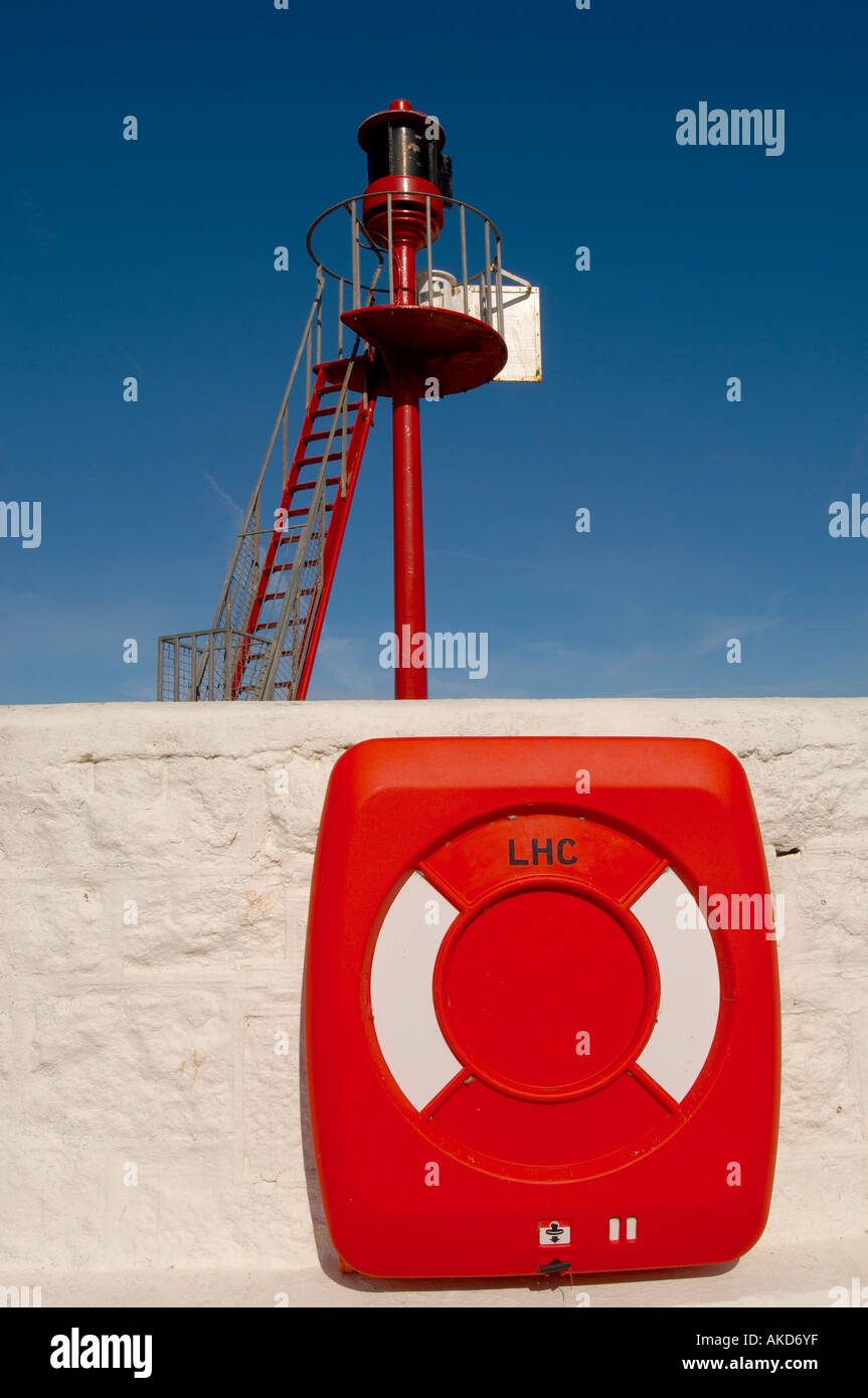 Red Lifebuoy Mounted On The Wall Of Banjo Pier With The Red Navigation