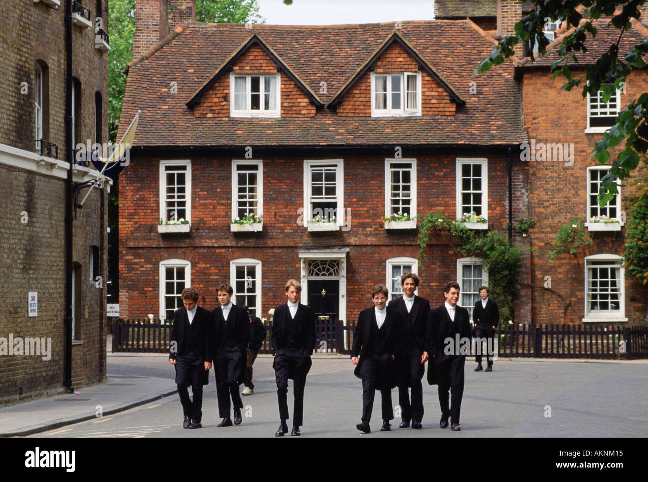 Eton schoolboys in traditional tailcoats at Eton College boarding Stock