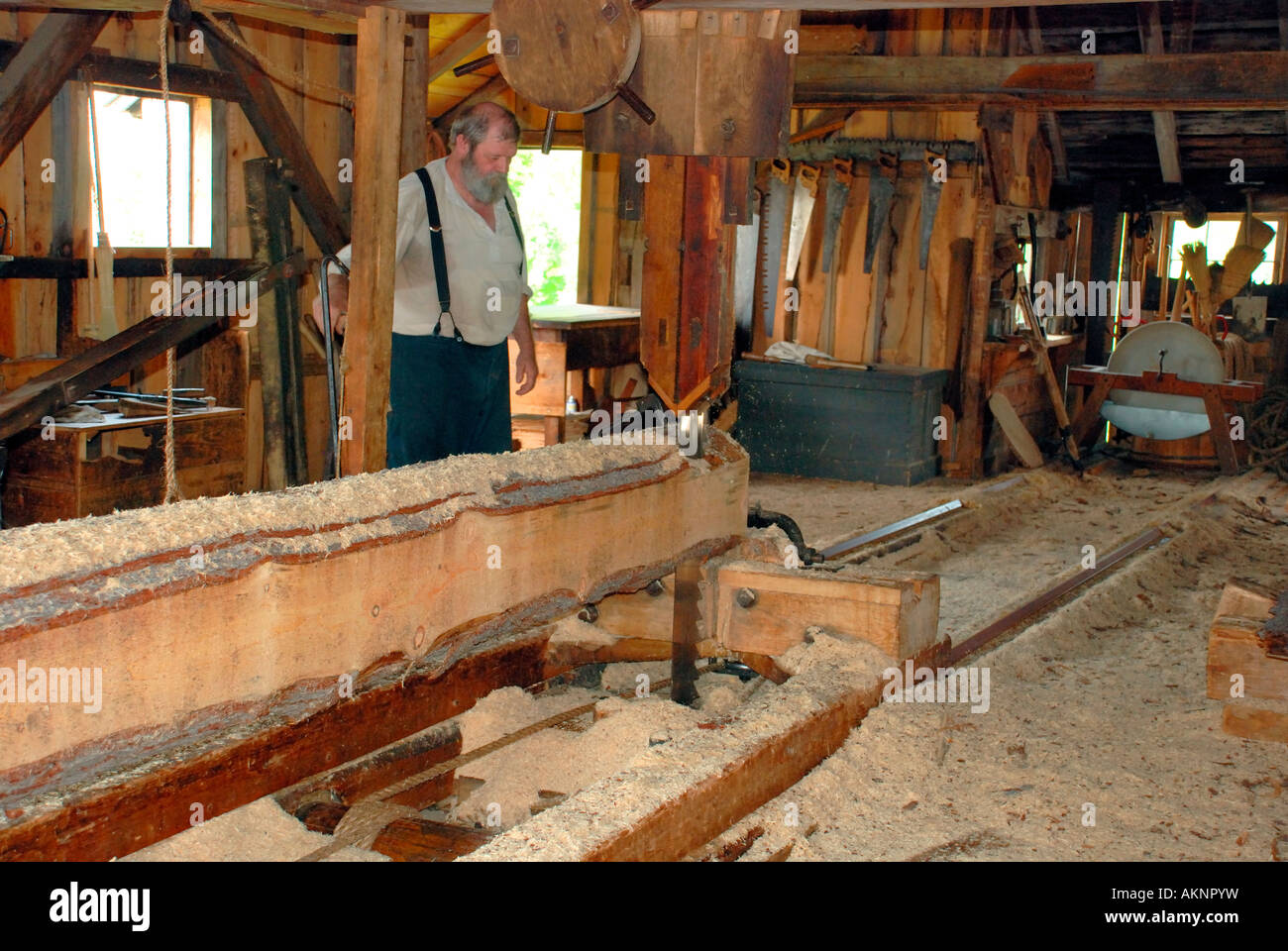 sawmill cutting log with steam saw in 1860s mill Stock Photo 15044844