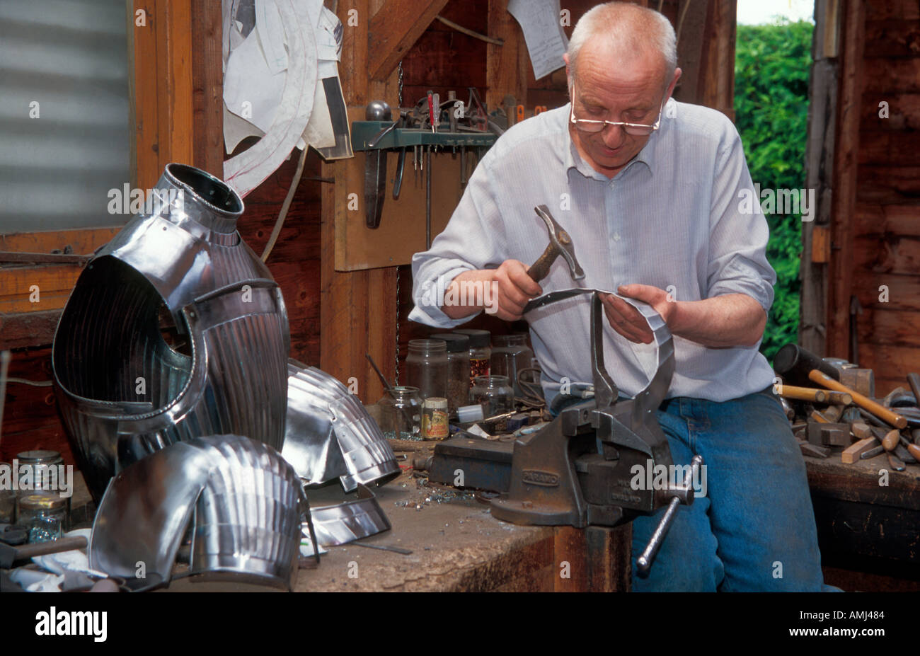 Traditional craftsman Peter Leicht making suits of armour from sheet