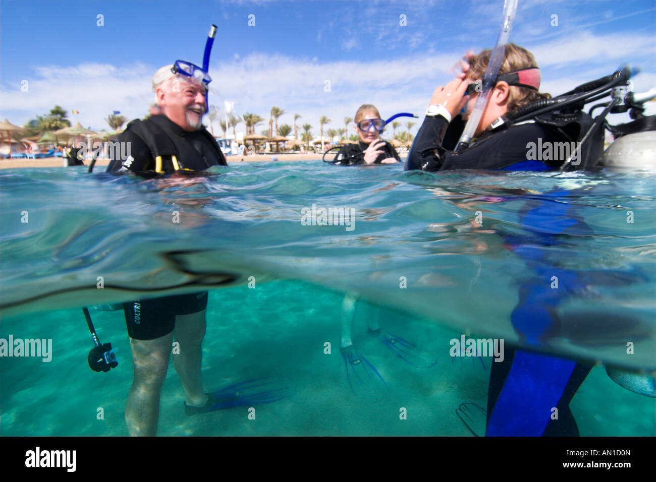 Learning to scuba dive standing off beach [shallow water] Sharm El