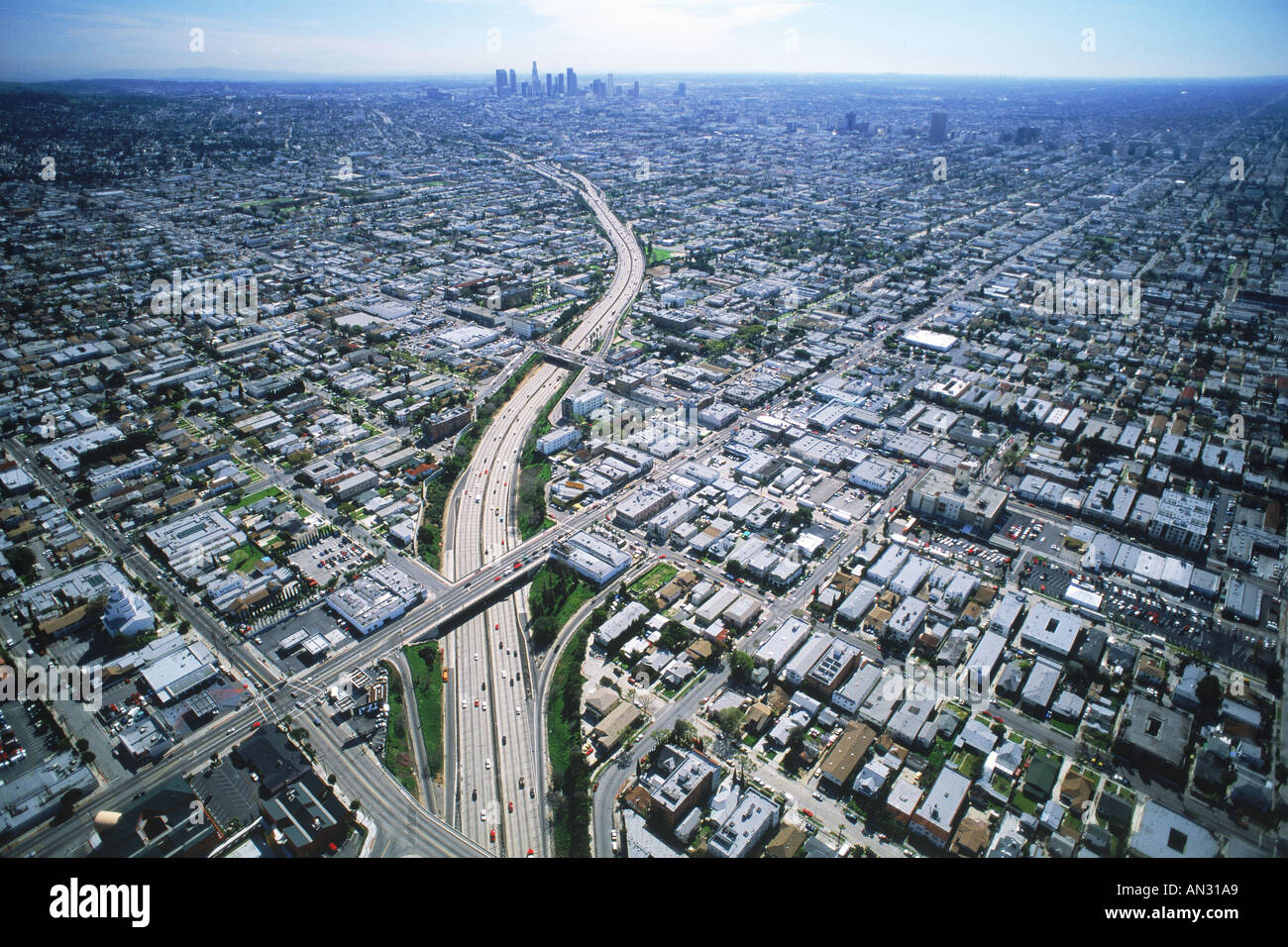 http://c8.alamy.com/comp/AN31A9/aerial-view-of-freeway-cutting-through-los-angeles-urban-sprawl-AN31A9.jpg