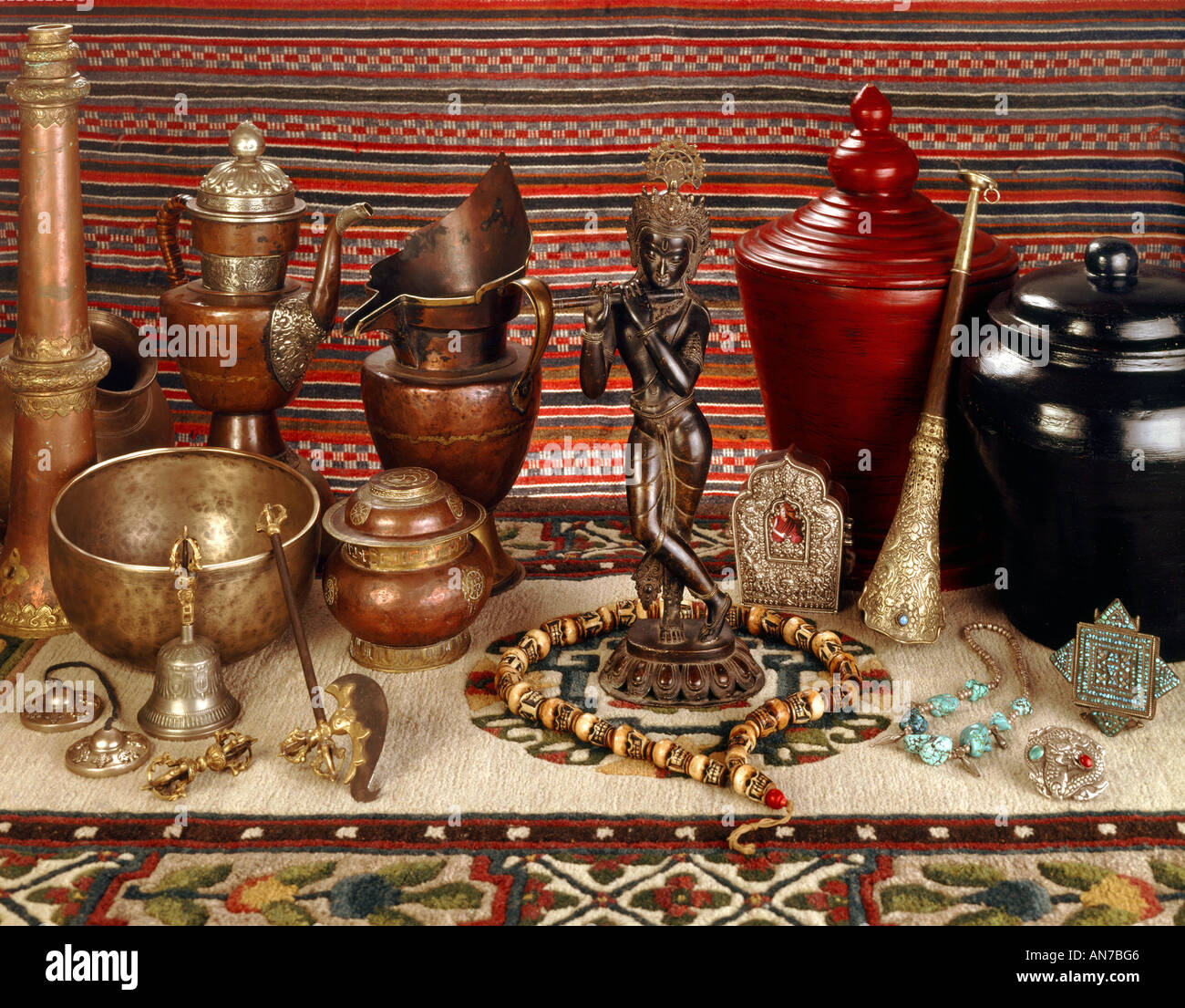Asian Artifacts asian artifacts ritual objects with krishna statue stock photo Asian Artifacts asian artifacts ritual objects with krishna statue stock photo