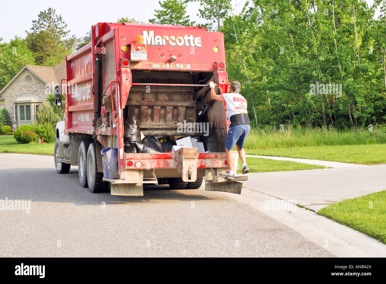 Local Neighborhood rubbish collection workers pick up household trash