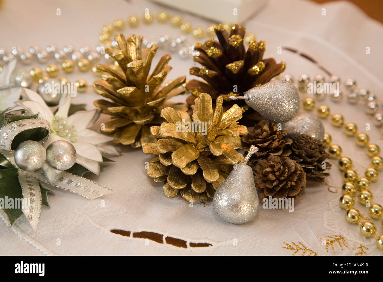 arrangement of christmas decorations of pine cones and arrangement of christmas decorations of pine cones and