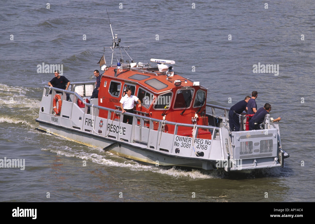 River Thames Boat Fire | fire boat river thames london uk stock photo royalty River Thames Boat Fire | fire boat river thames london uk stock photo royalty