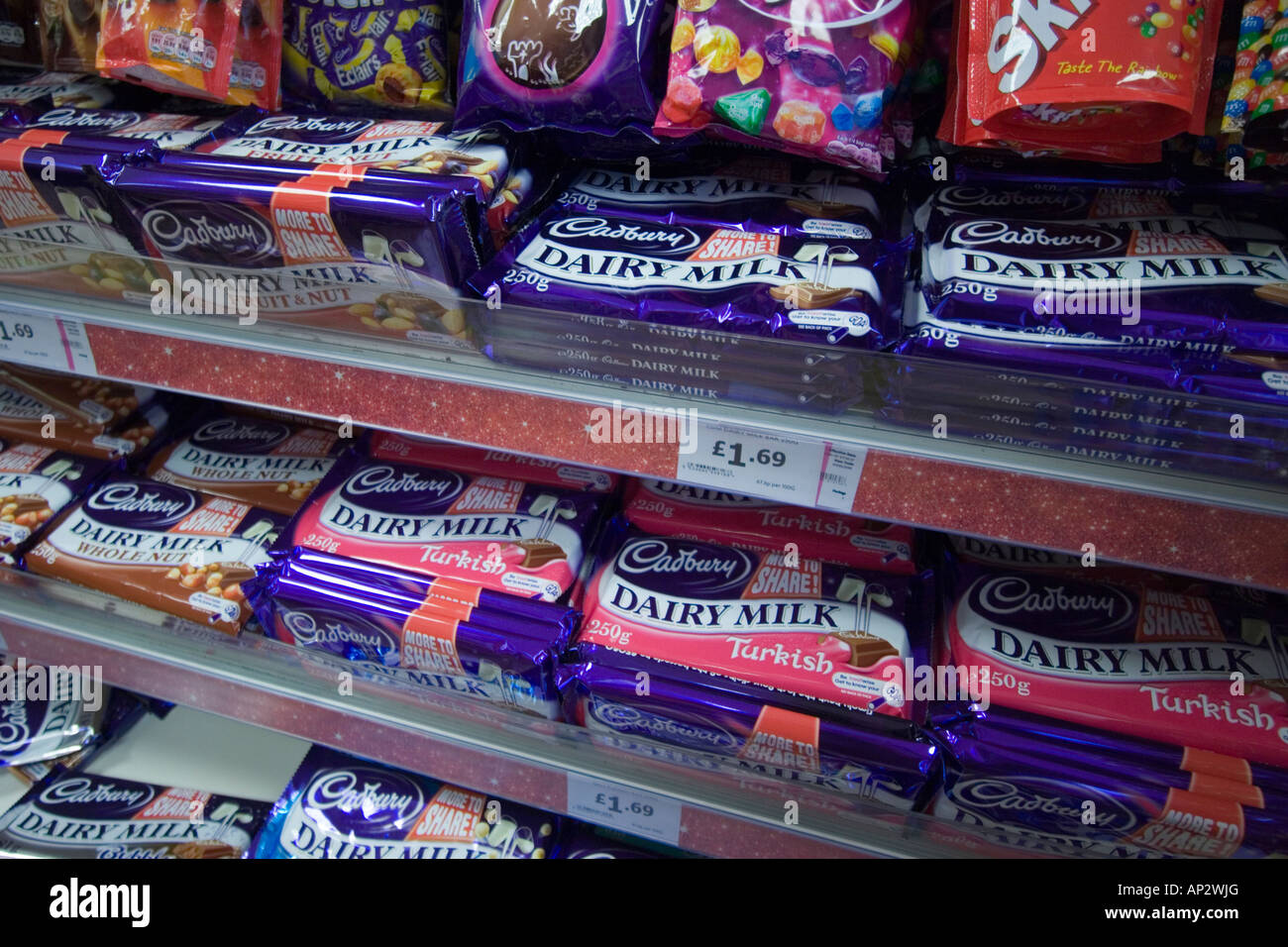 Cadbury s Dairy Milk for sale on supermarket shelves Stock Photo