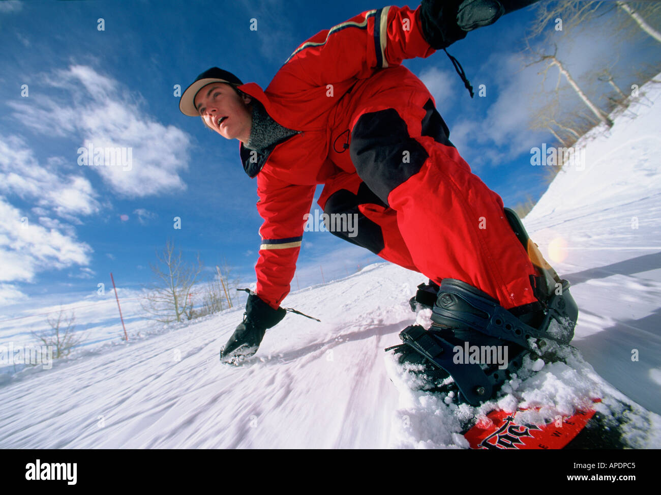 Snowboarding action, balance and concentration, Colorado, USA Stock