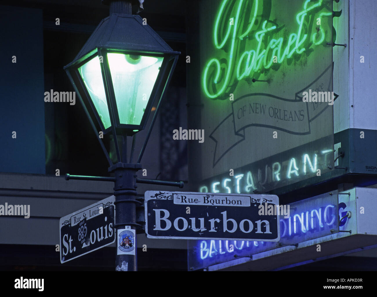BOURBON STREET sign post with STREET LAMP in the French Quarter, USA