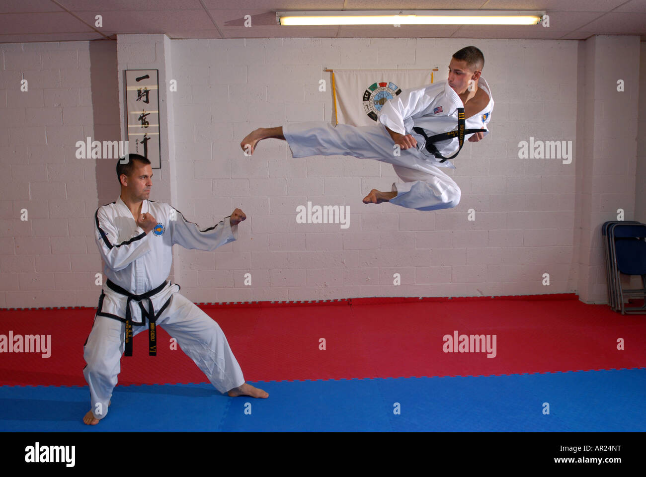 Martial arts flying sidekick demonstration in Dojo Stock Photo, Royalty Free Image 15913667