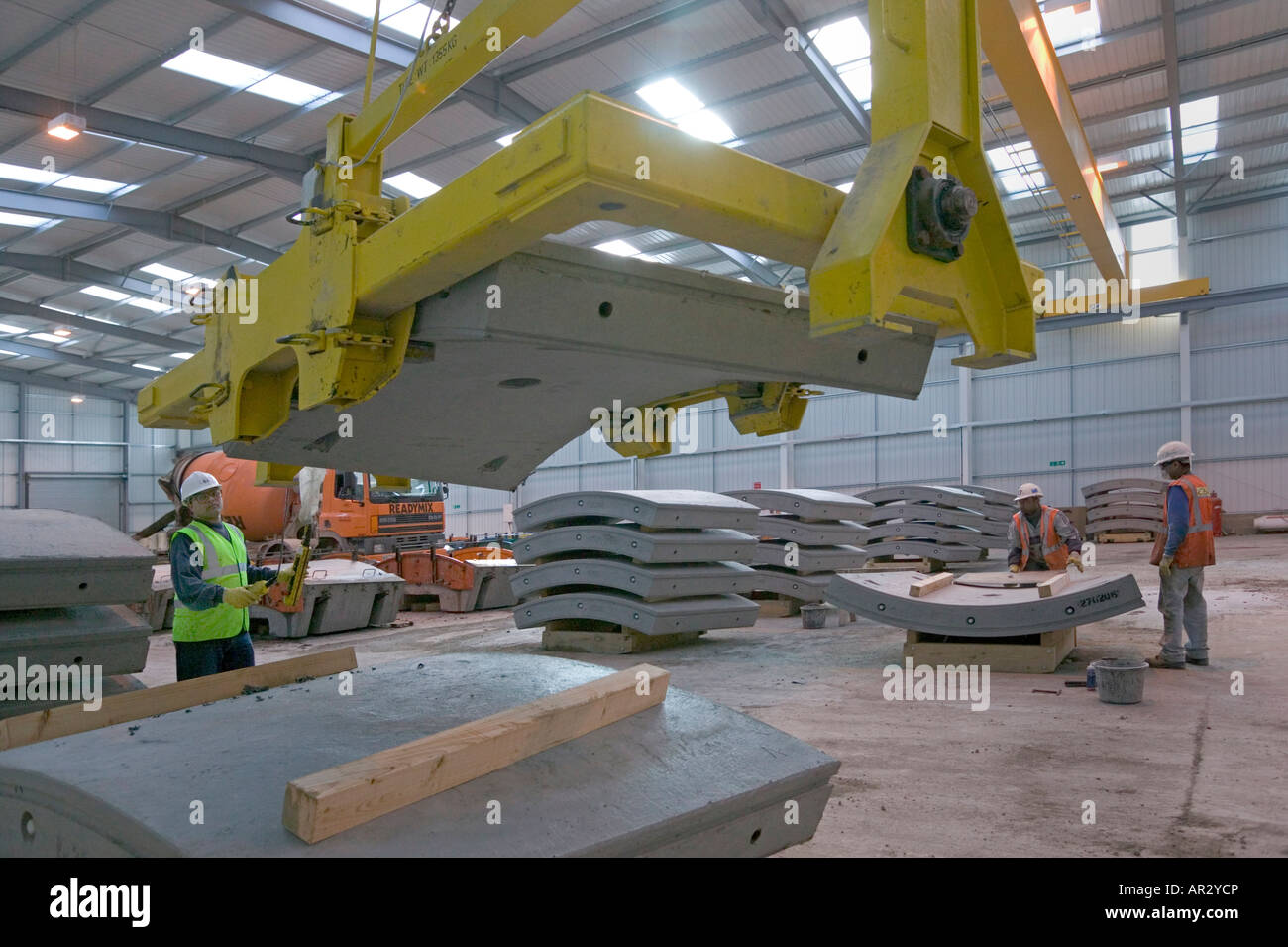 Using a special handling device which can rotate heavy concrete Stock Photo, Royalty Free Image