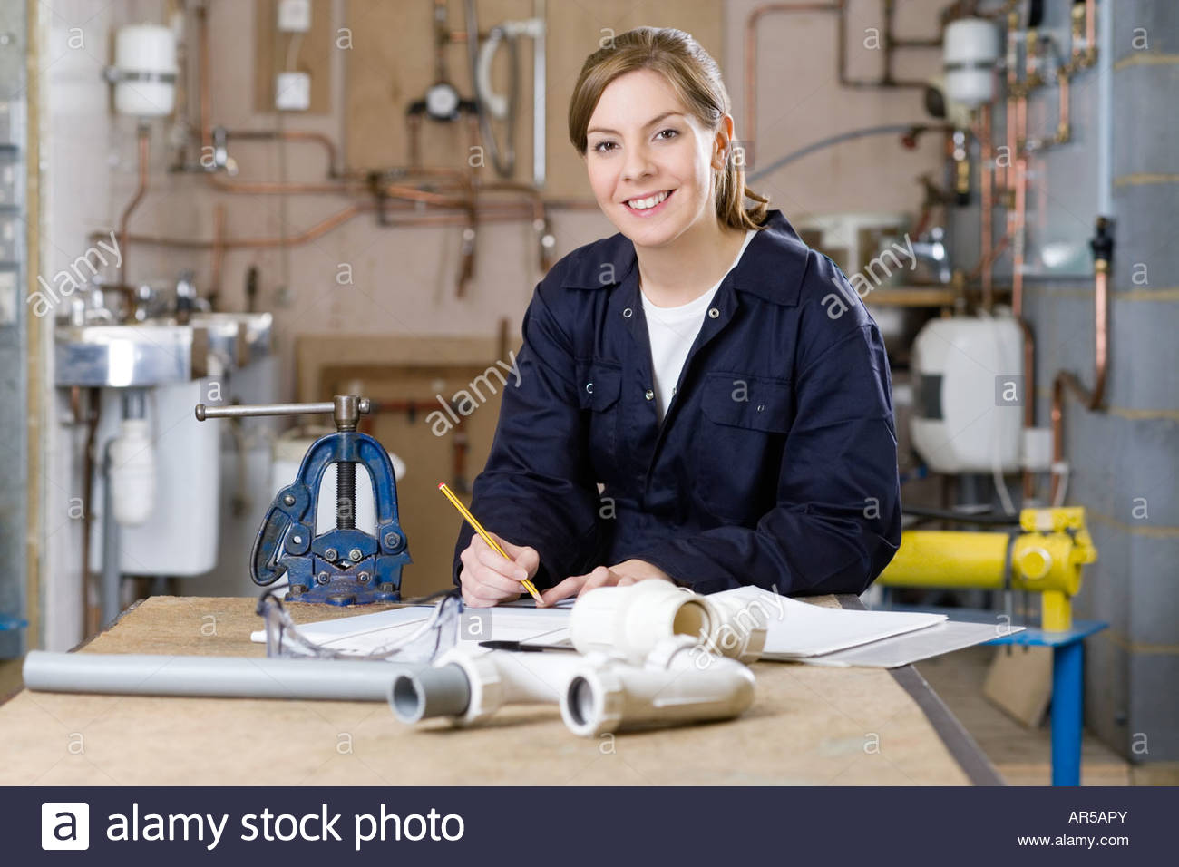 apprentice-plumber-stock-photo-royalty-free-image-15943922-alamy